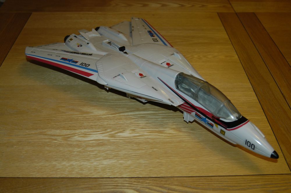 A shell with just the canopy, two engines, long range fuel tanked (glued in place) and front wheel.  Fairly nice stickers and little or no discolouration.  There seems to be some problem with the wing opening mechanism - they can be opened only by pushing the front wheel down and closed with the mechanism.  Looks like the rear wings were stuck on at some time, as there is some glue residue and a couple of small bits of plastic.  Could be cleaned up for a repair job