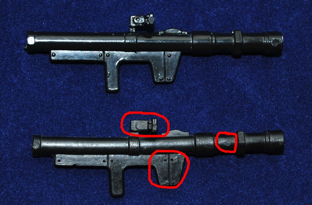 4.notice differen't detail to the viewfinder and again the 4 dots on the handle instead of 3, plus the barrel has a circle mark