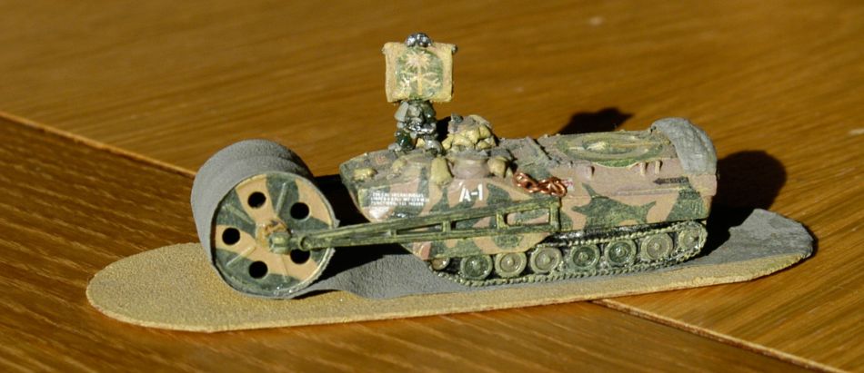 Beach Crawler laying down beach mat (like Hobbart's funnies on D-Day).  Not sure why I added Saudi decals, but they work with the sandy finish