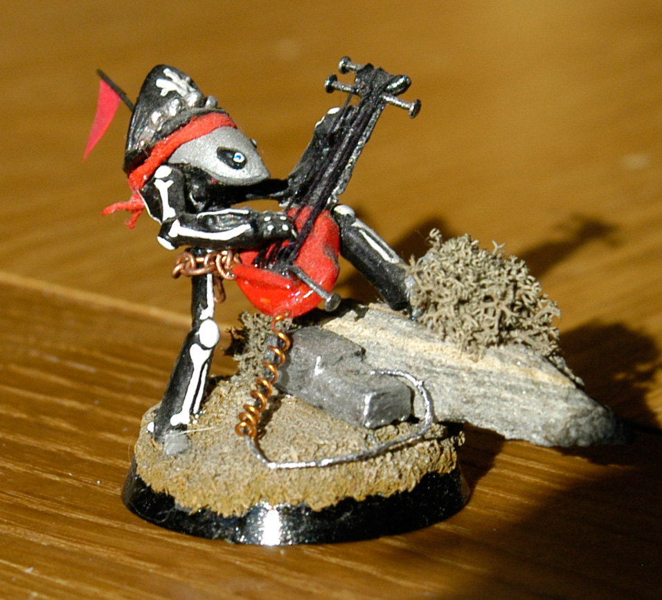 Eldar Walker customised in the style of a heavy metal guitarist.  One of the flags from the back has fallen off!