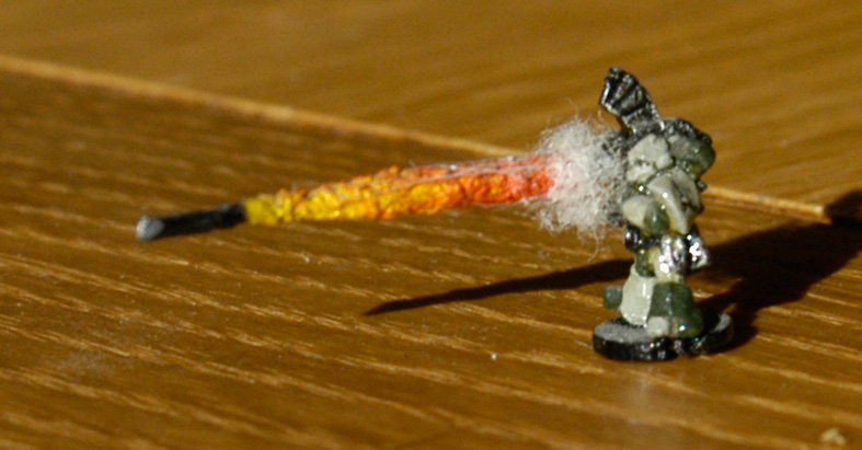 Another one I always liked, with the rocket firing from the Space Marine's bazooka.  I also have a firing Space Marine on his in flight rocket pack, but it's in need of repair