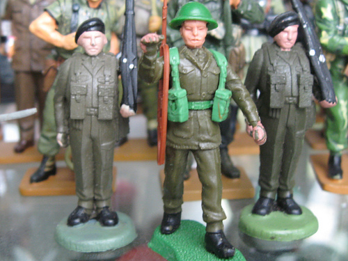 The one standing to attention reminds me of an old photo of Dad during national service.